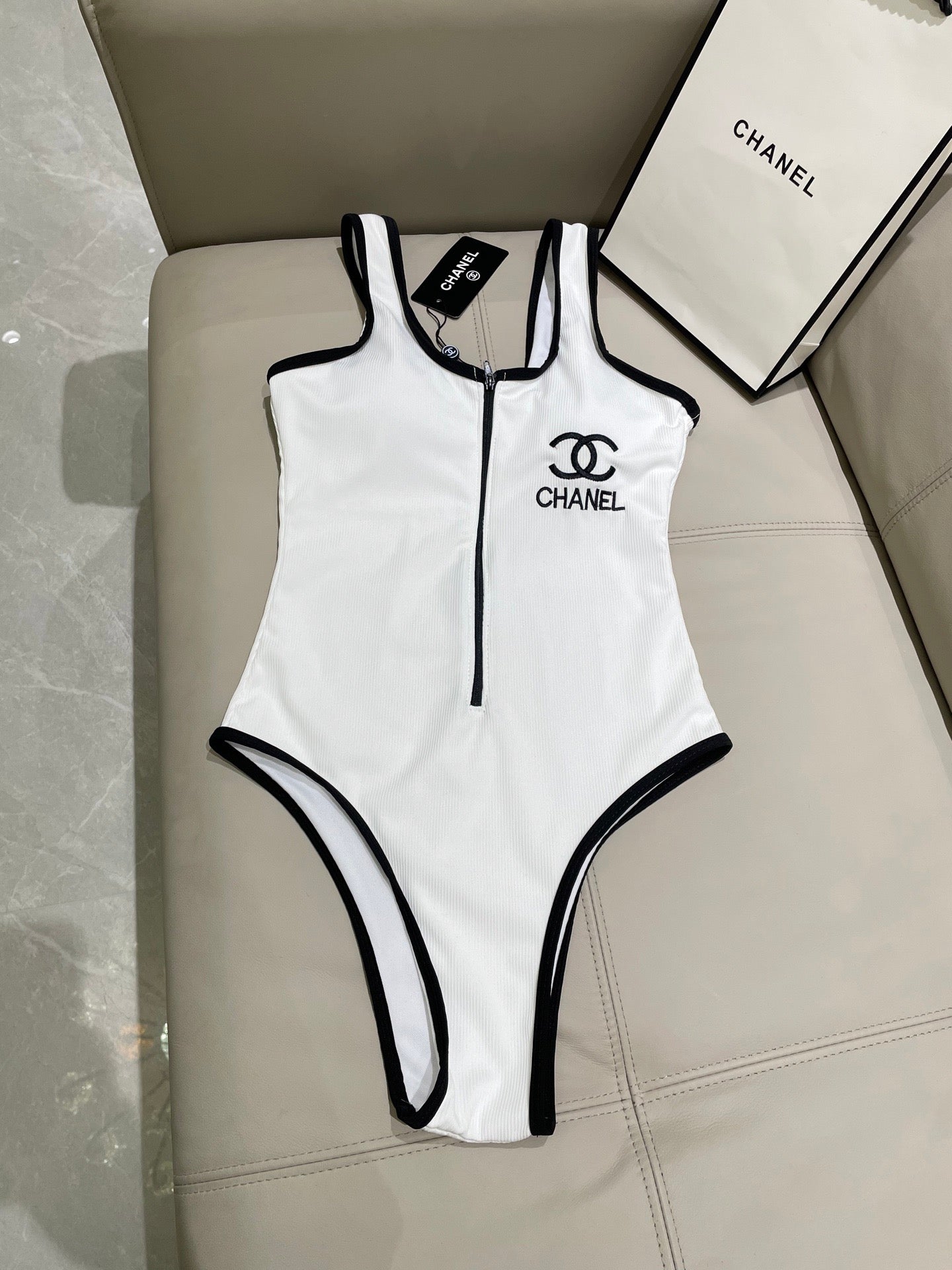 One-piece swimsuit with built-in bra pads.