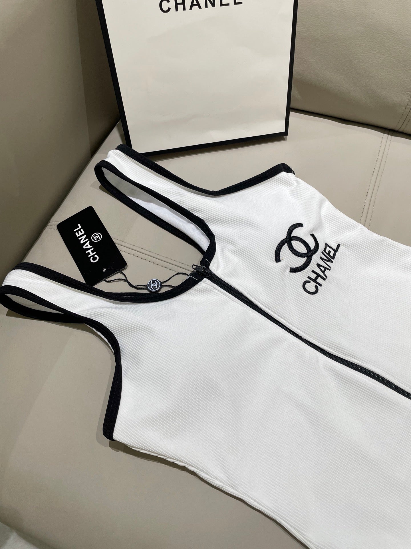 One-piece swimsuit with built-in bra pads.