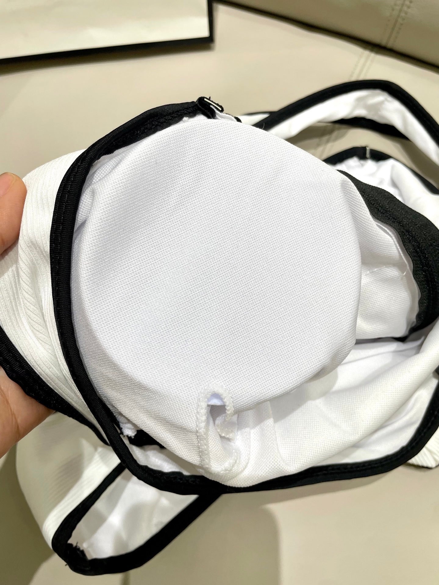 One-piece swimsuit with built-in bra pads.