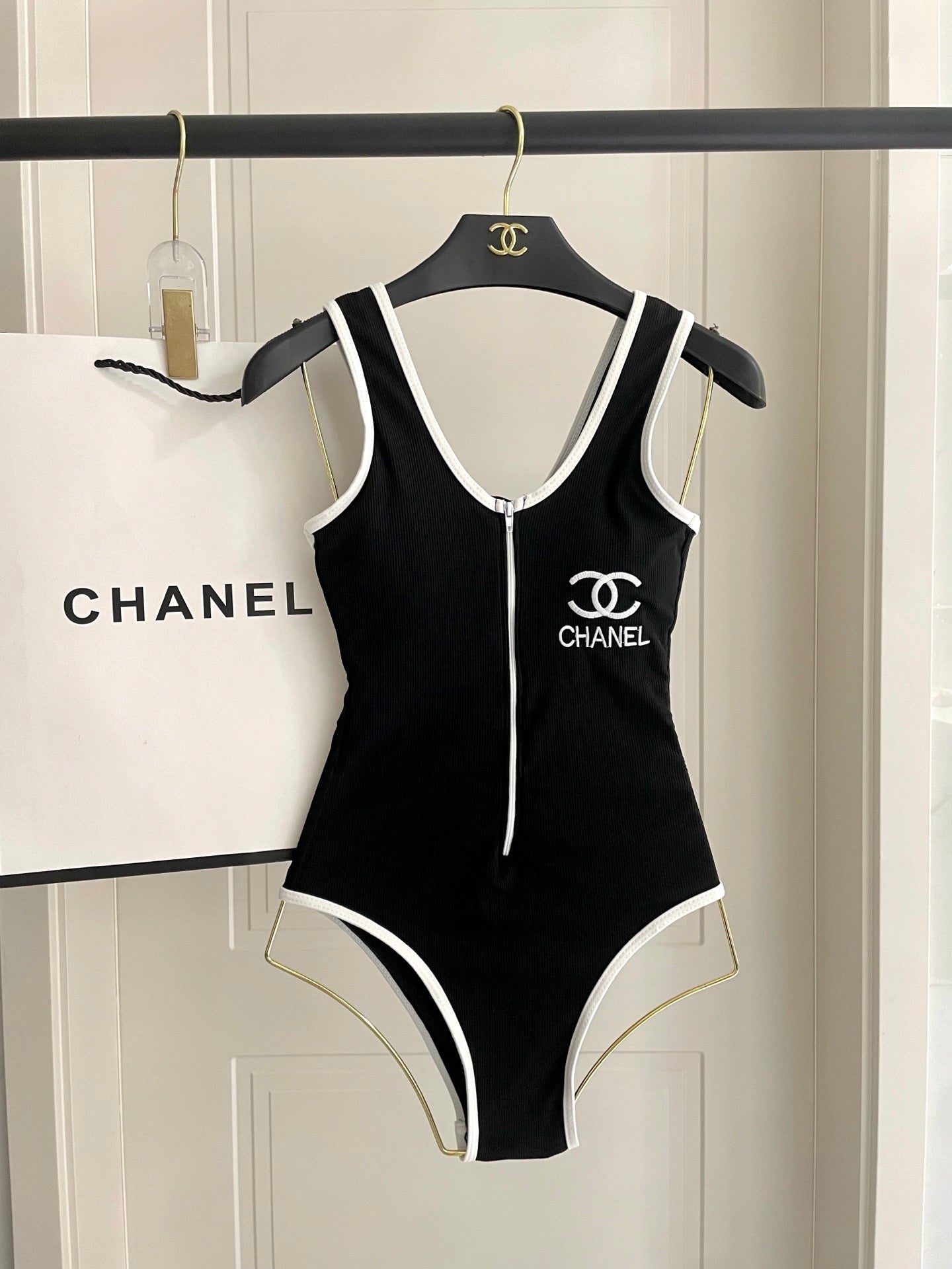 One-piece swimsuit with built-in bra pads.