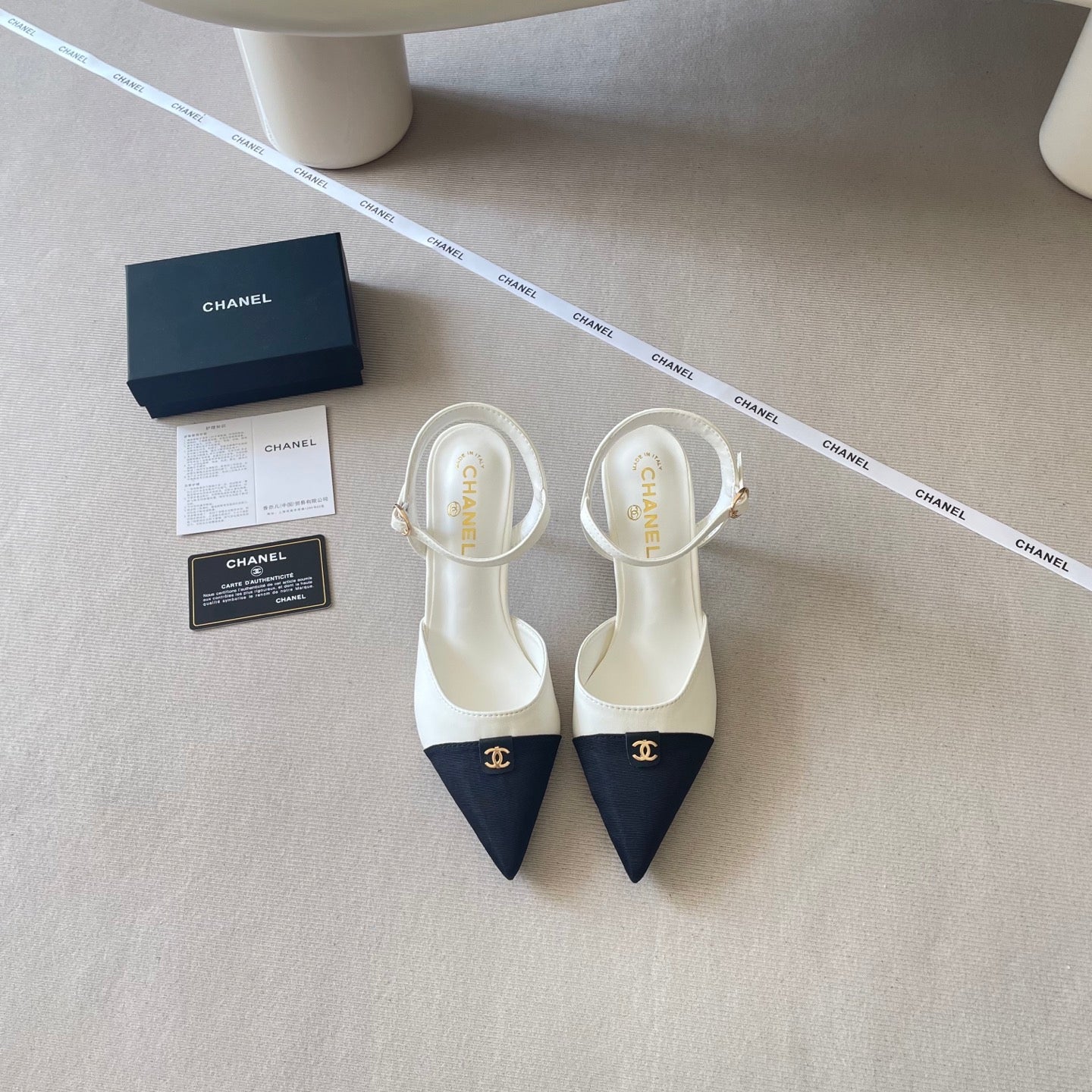 Pointed-toe, color-blocked high-heeled sandals