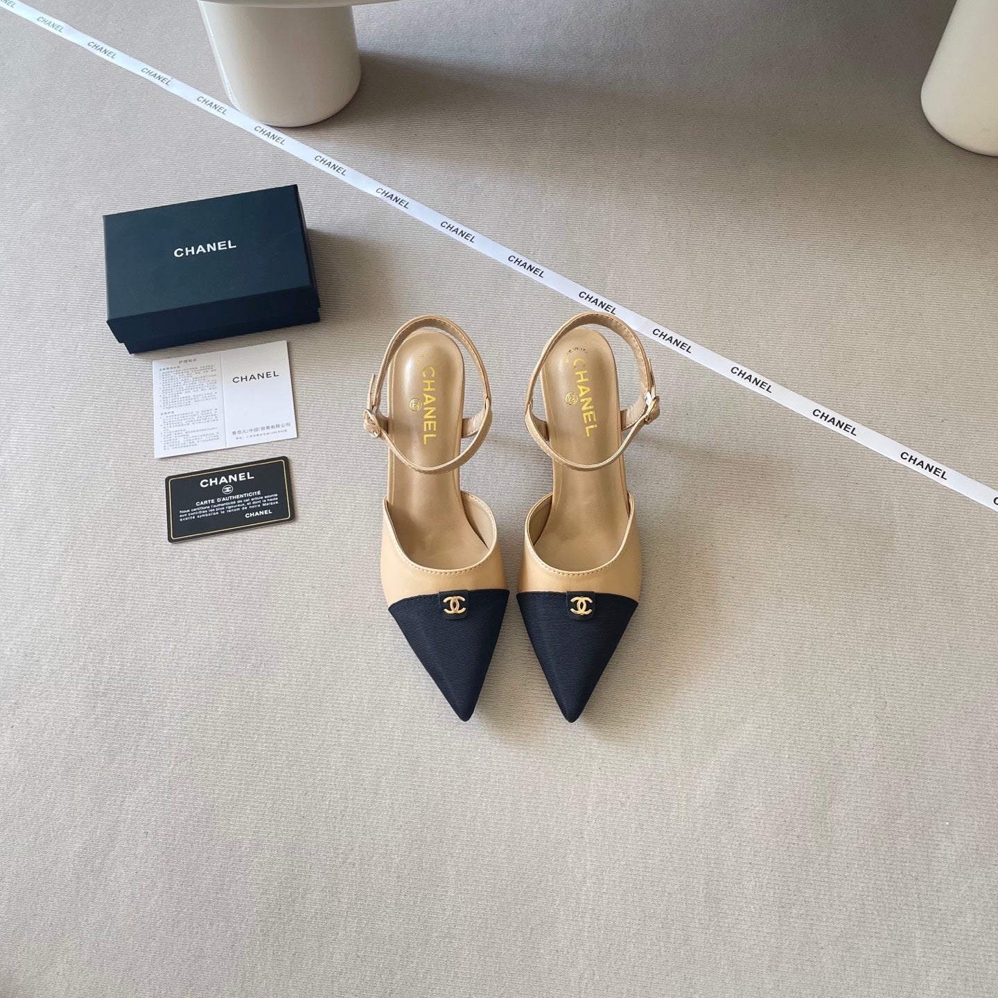Pointed-toe, color-blocked high-heeled sandals