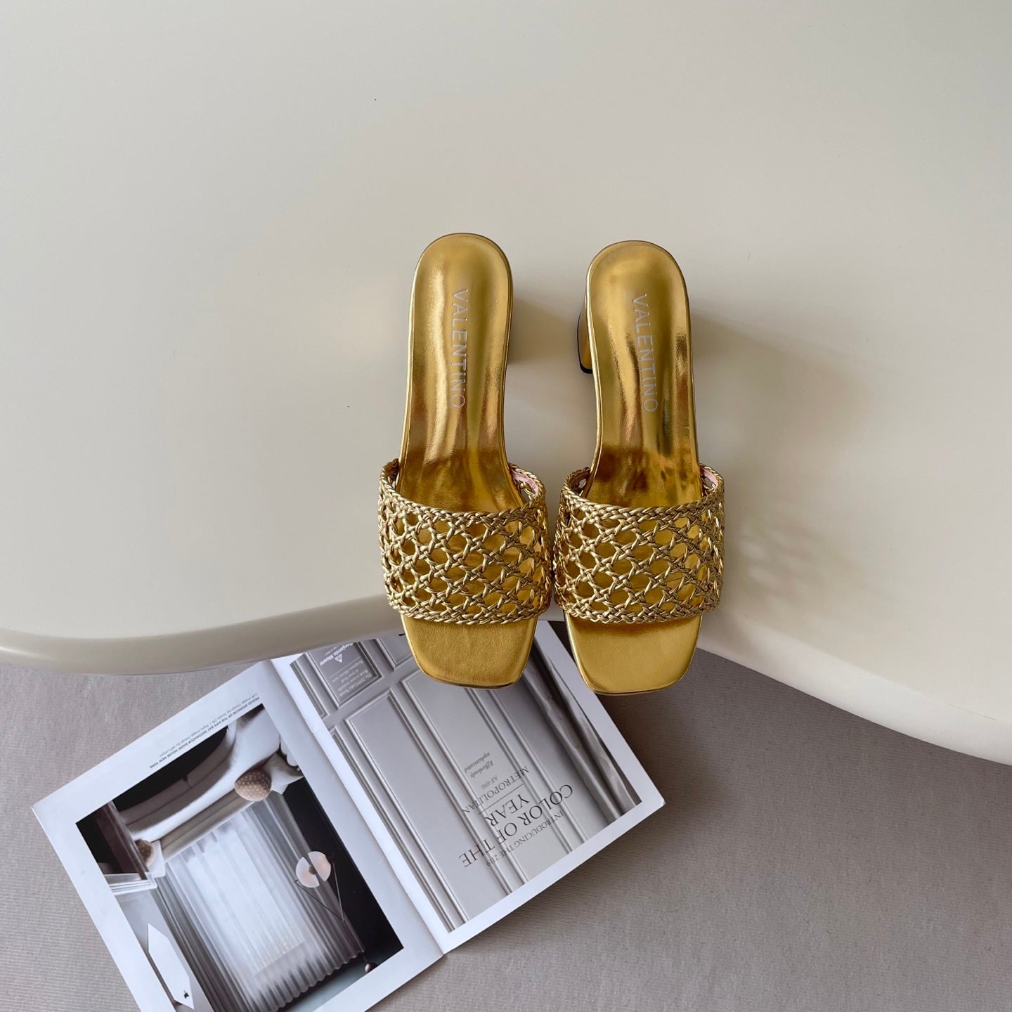 Openwork high-heeled slippers