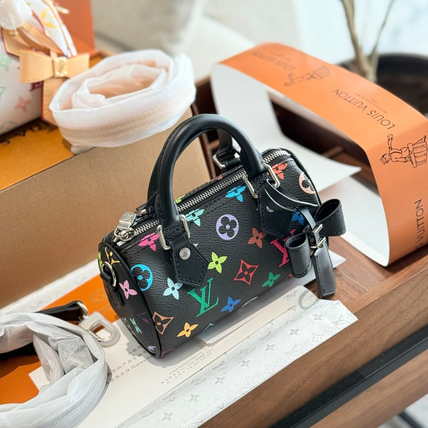 The Louis Vuitton and Takashi Murakami collaboration in black multicolor.