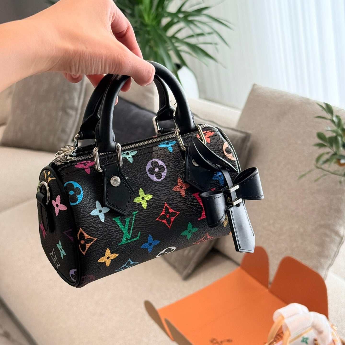 The Louis Vuitton and Takashi Murakami collaboration in black multicolor.