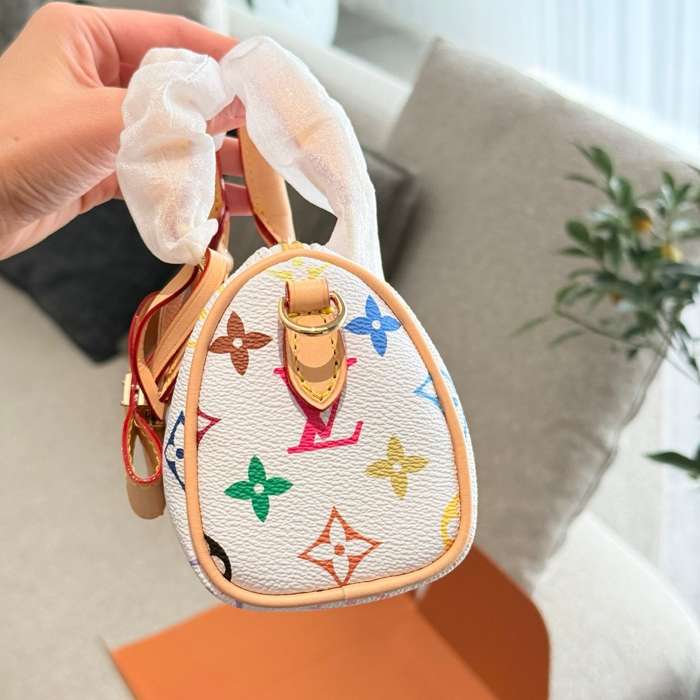 The Louis Vuitton and Takashi Murakami collaboration in black multicolor.