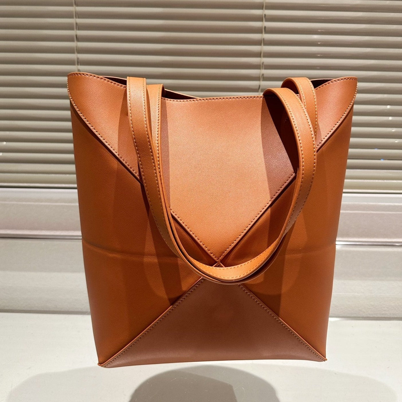 L   Head Cowhide Bucket Bag