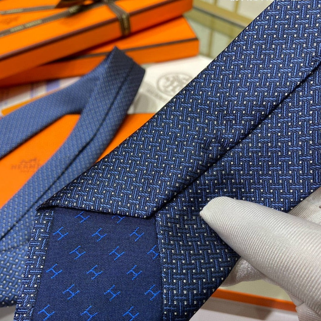 HE * braided pattern tie