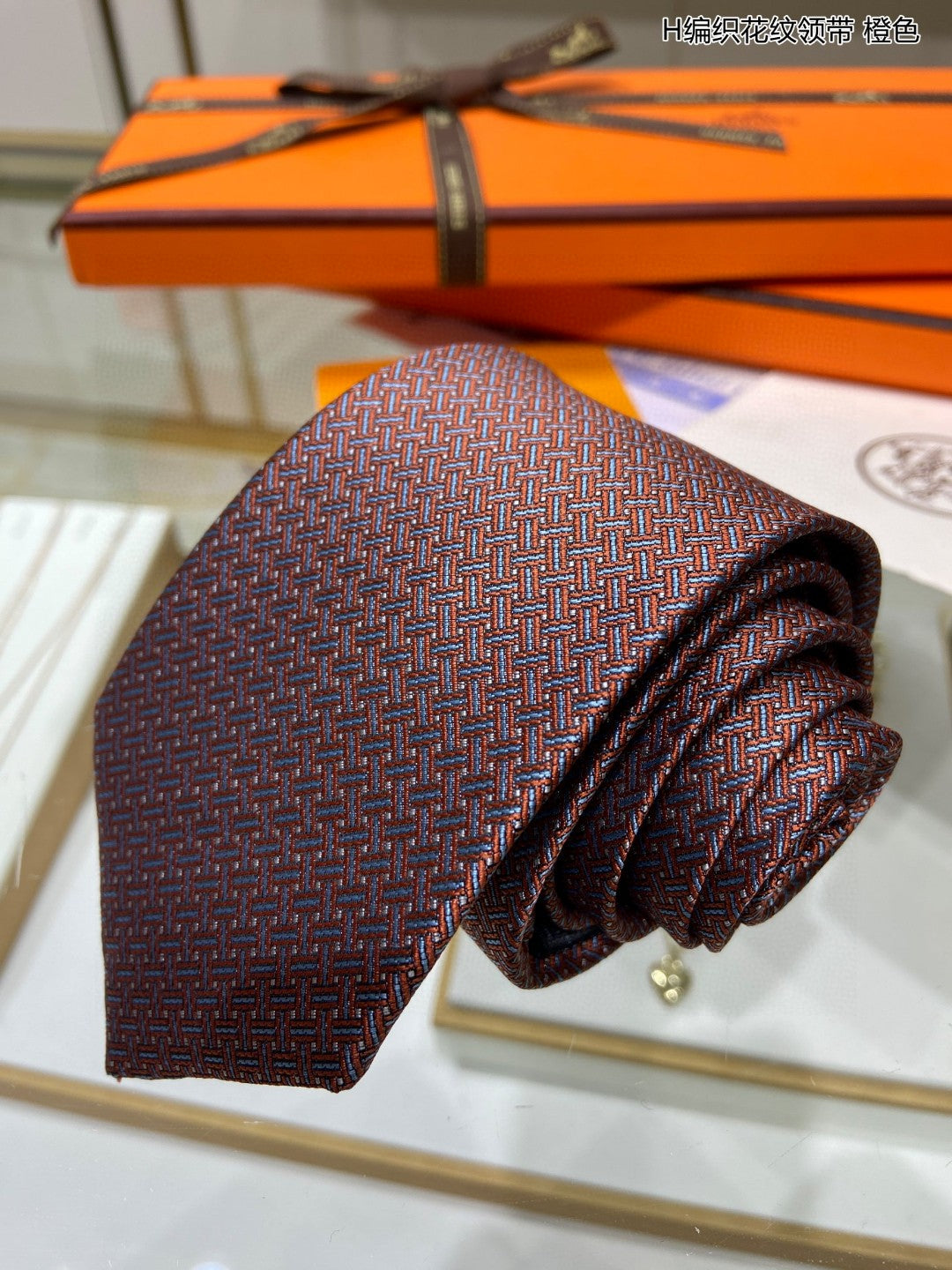 HE * braided pattern tie