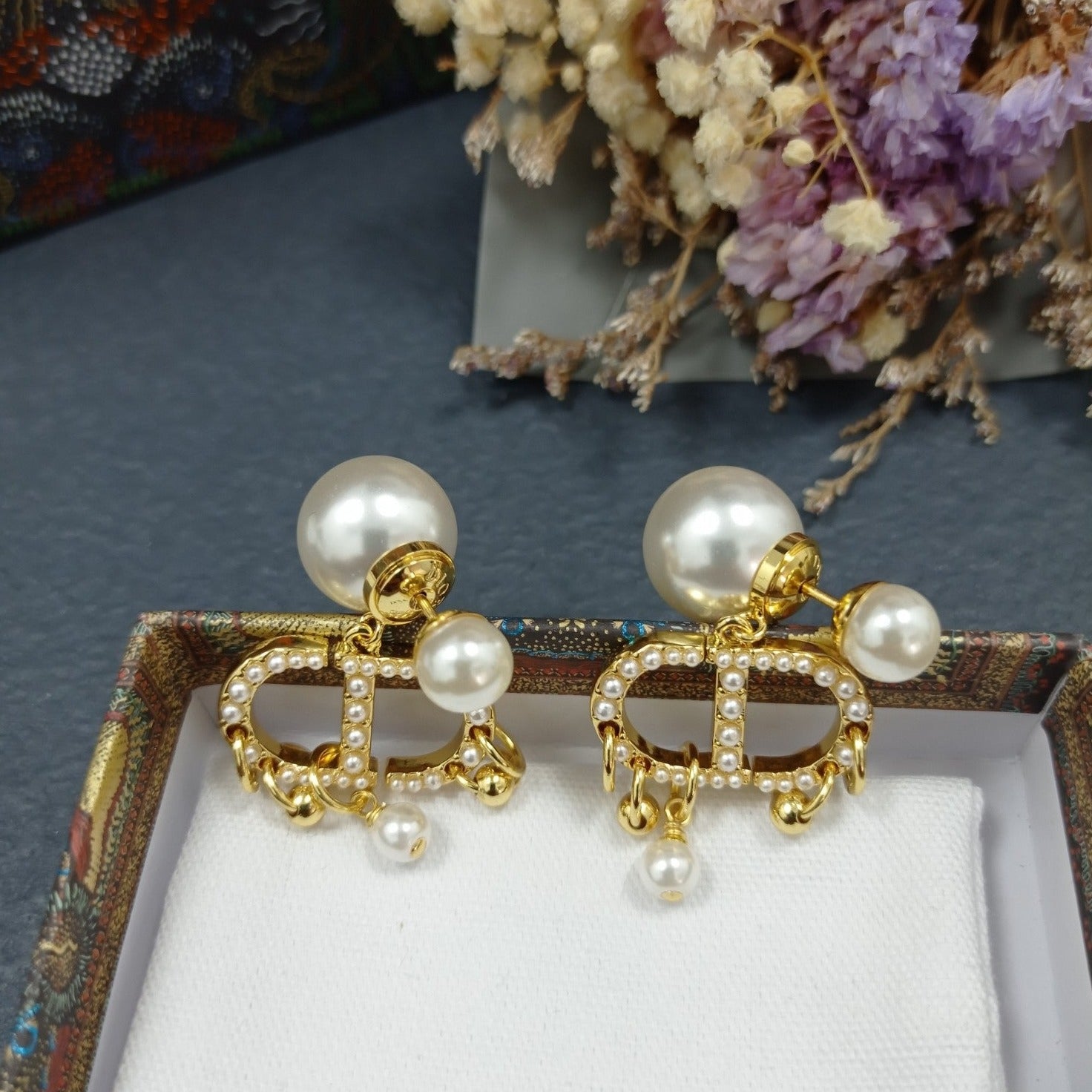 DI* pearl earrings