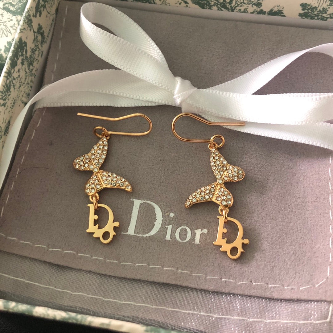 DI* butterfly diamond earrings
