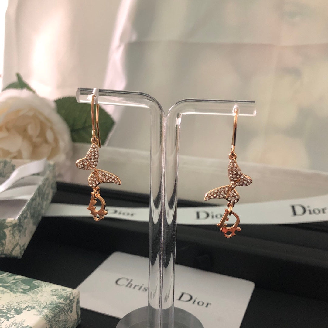 DI* butterfly diamond earrings