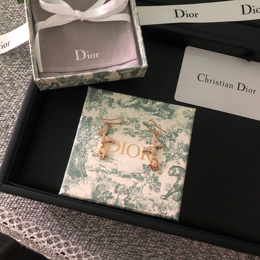 DI* butterfly diamond earrings