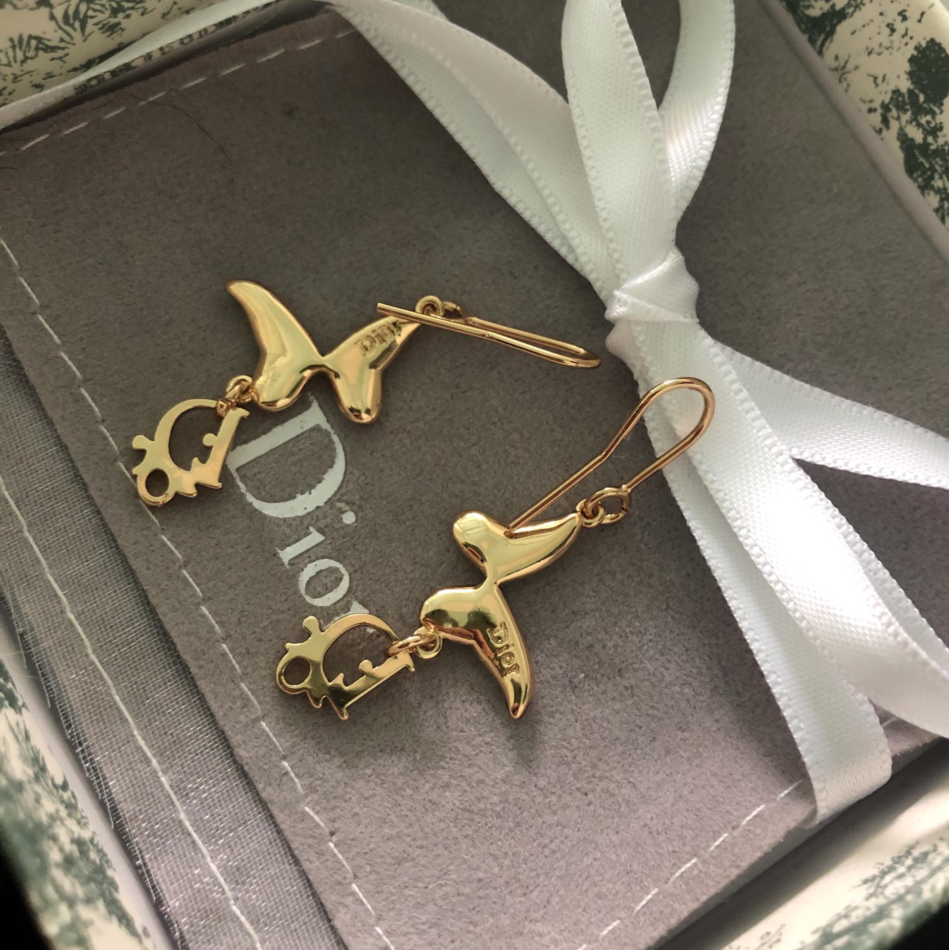 DI* butterfly diamond earrings