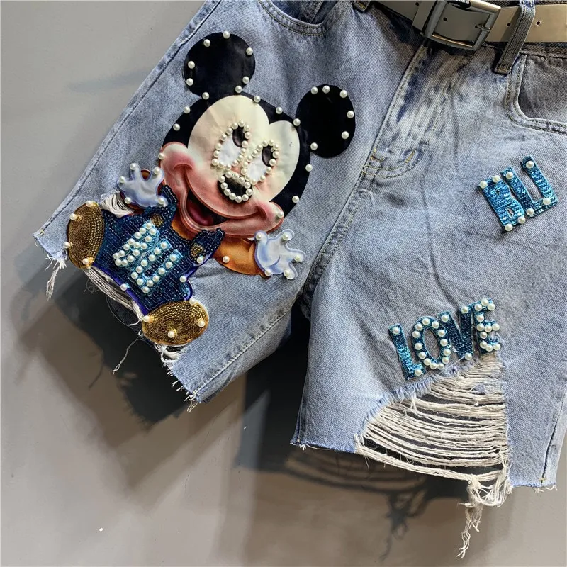 beaded hole denim shorts