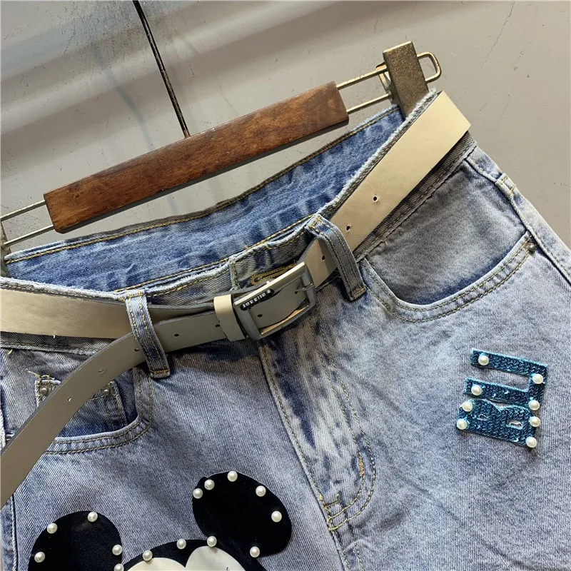 beaded hole denim shorts