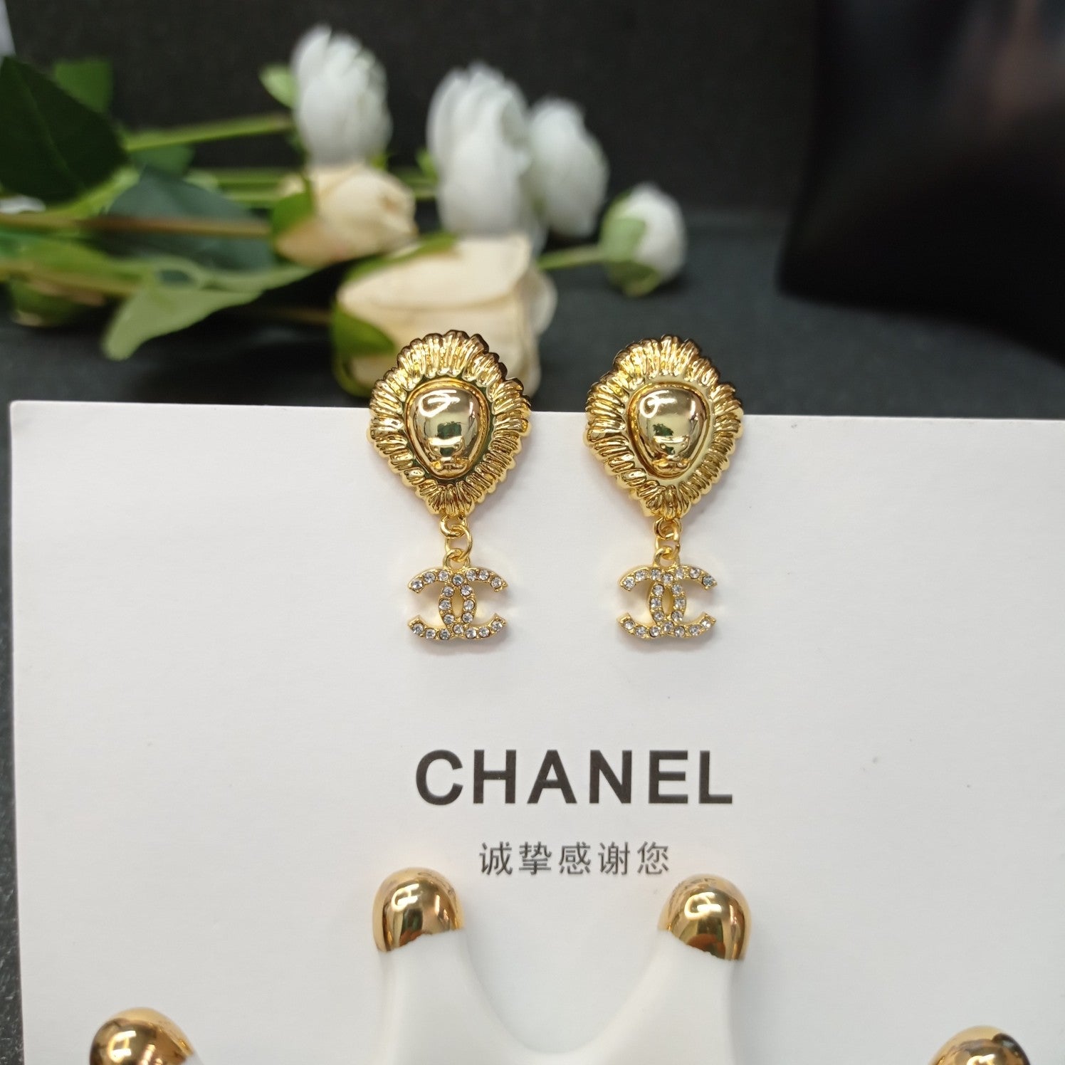 C  lion head earrings