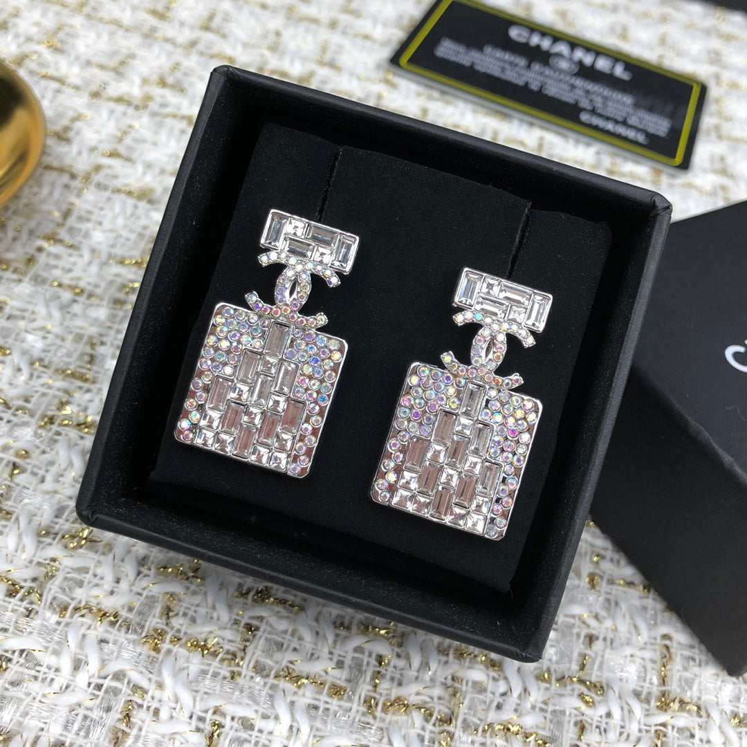 C  new perfume bottle white diamond earrings