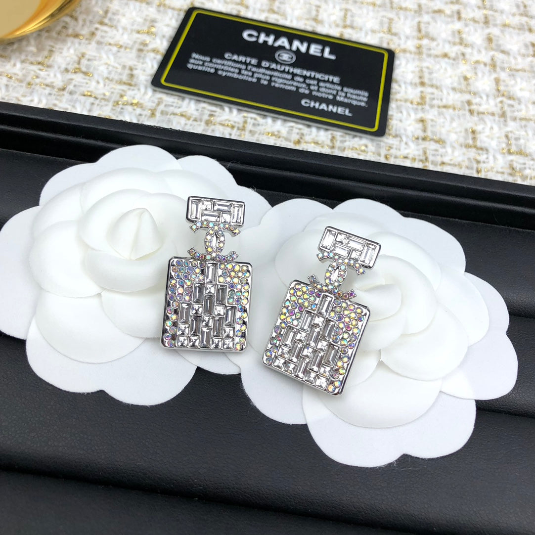 C  new perfume bottle white diamond earrings
