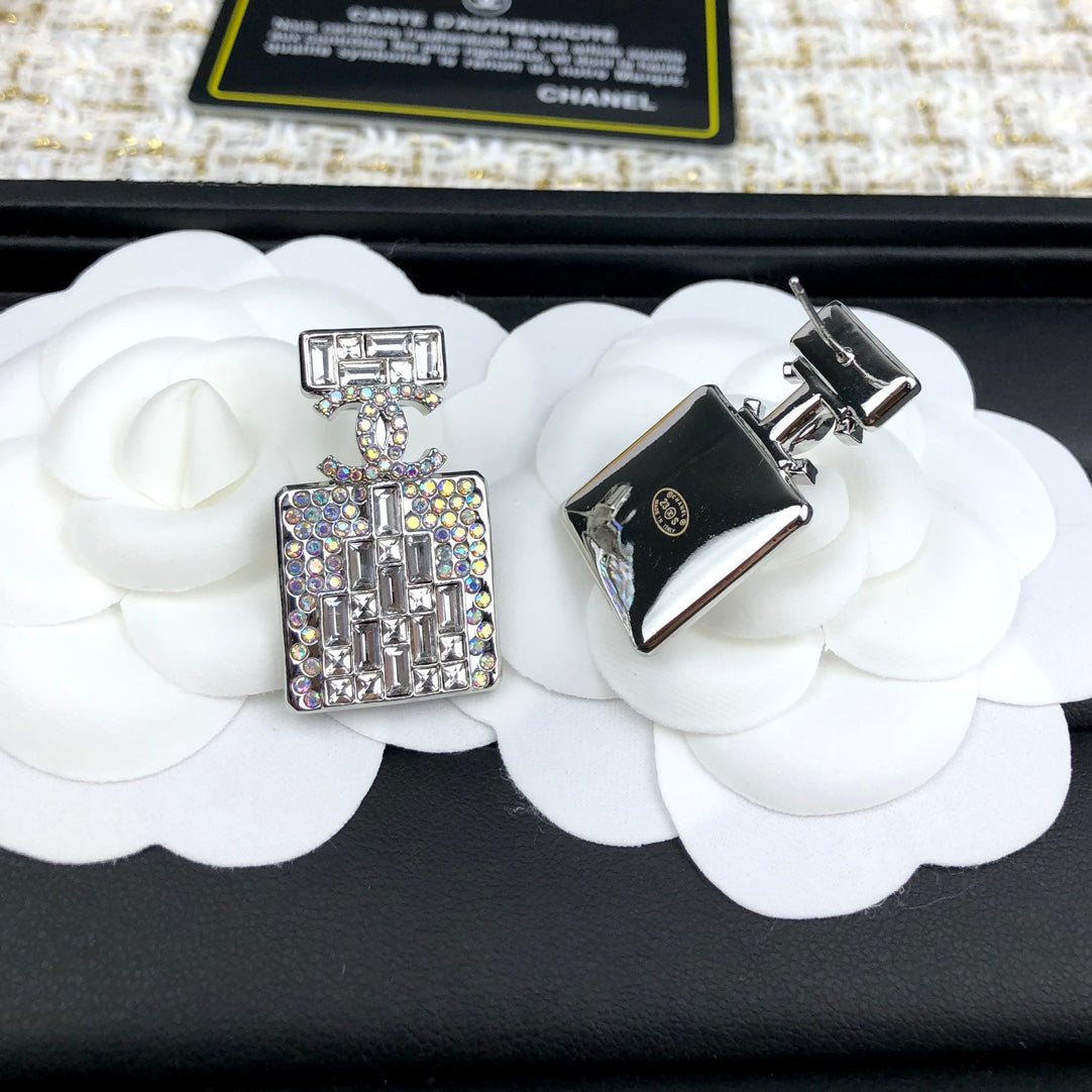 C  new perfume bottle white diamond earrings