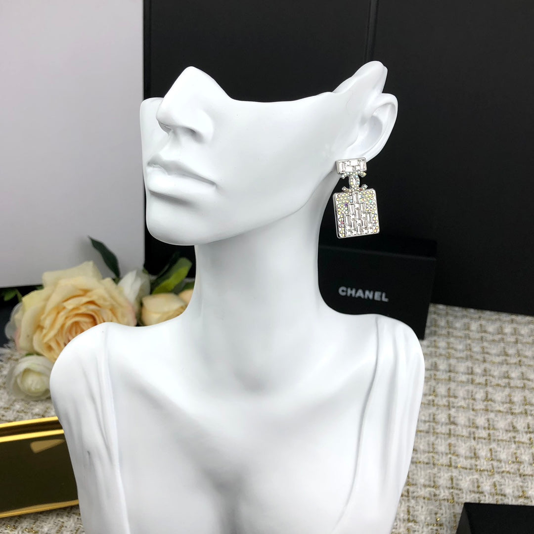 C  new perfume bottle white diamond earrings