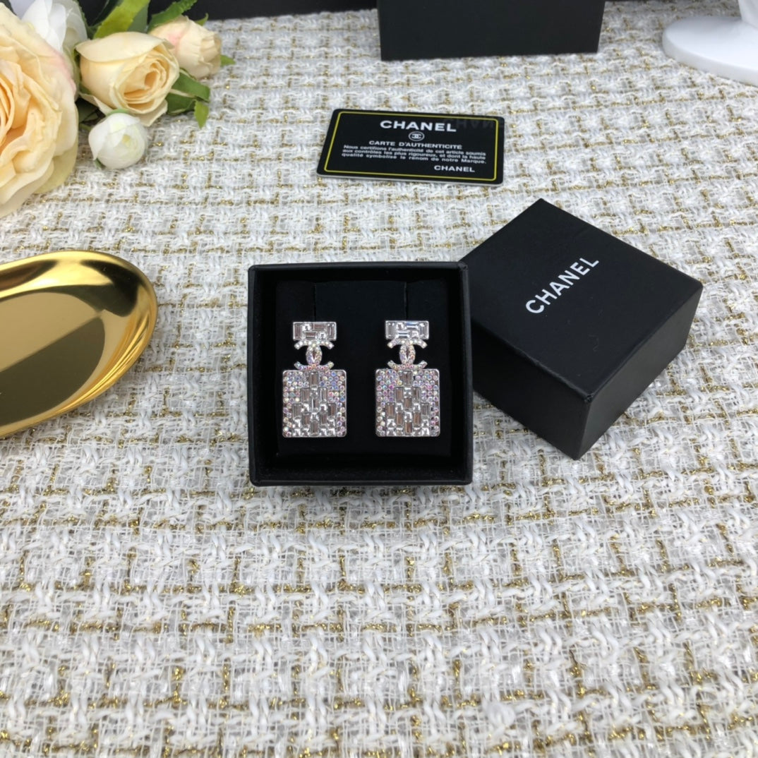 C  new perfume bottle white diamond earrings