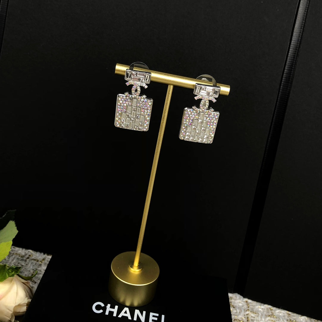 C  new perfume bottle white diamond earrings