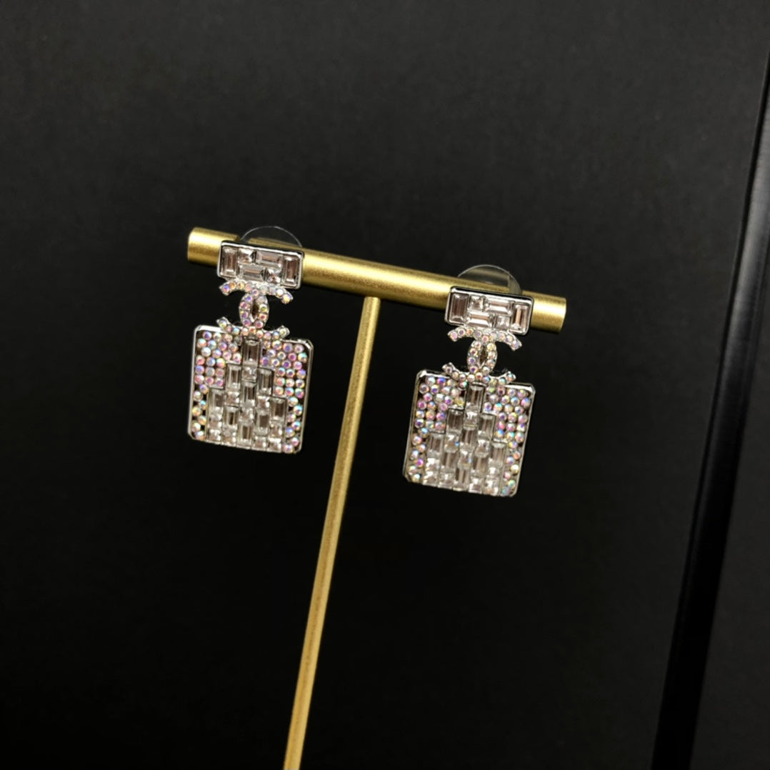 C  new perfume bottle white diamond earrings