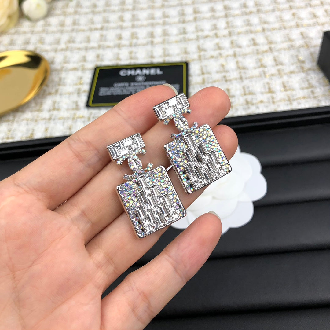 C  new perfume bottle white diamond earrings