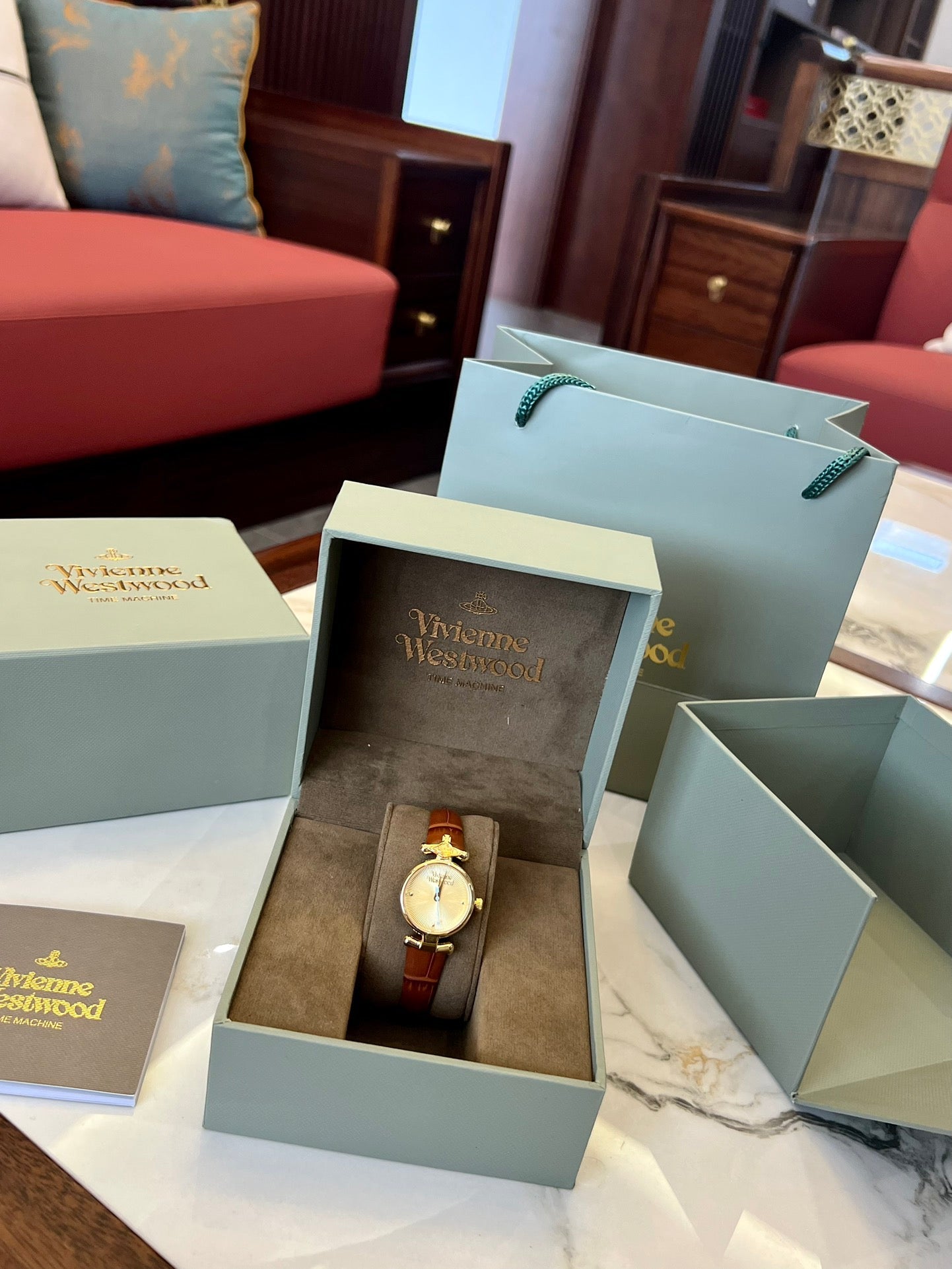 queen mother belt women's watch