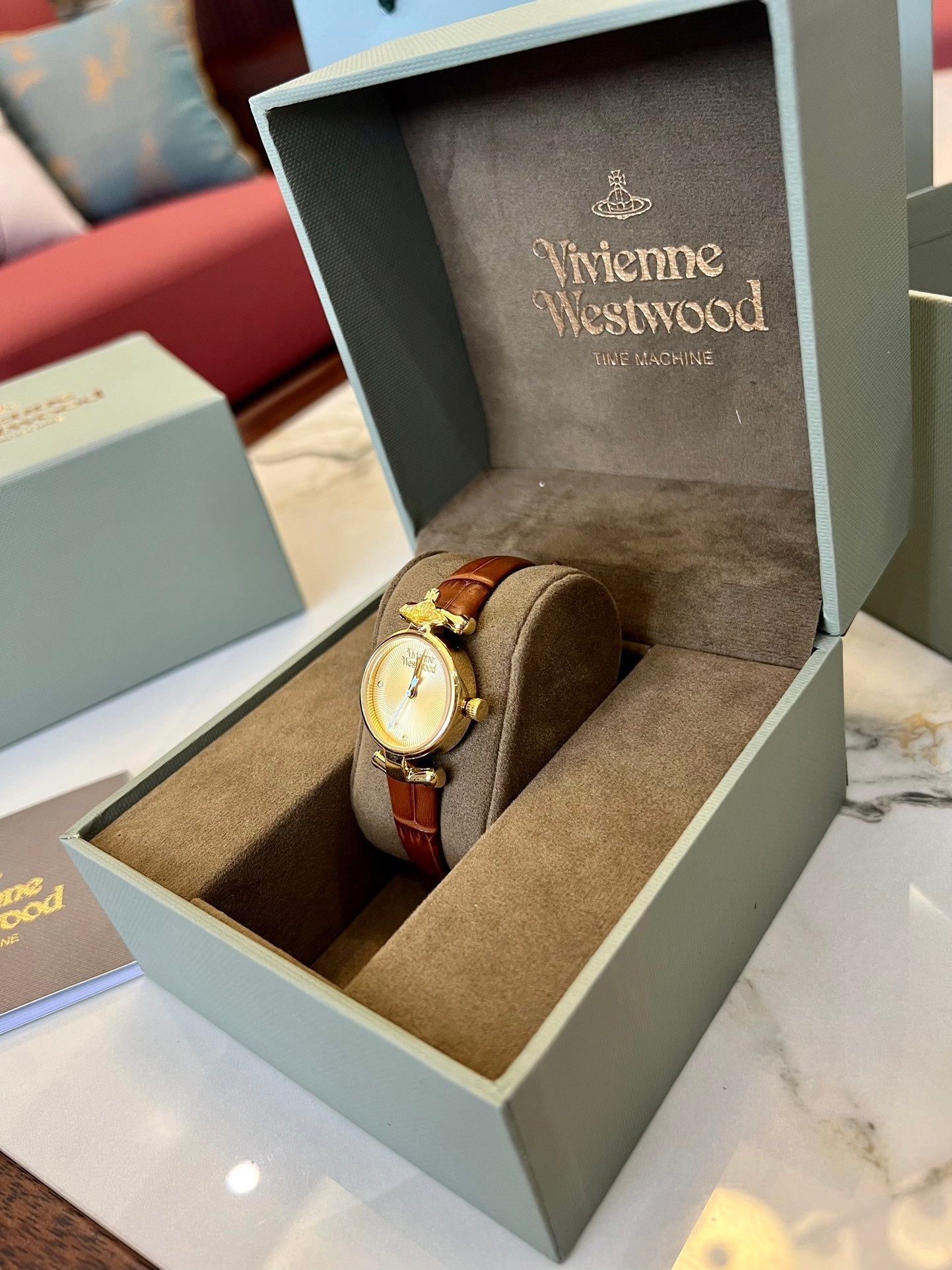 queen mother belt women's watch