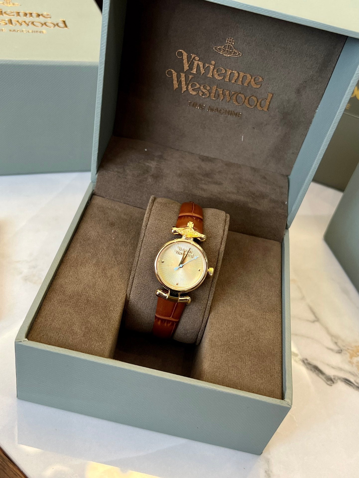 queen mother belt women's watch