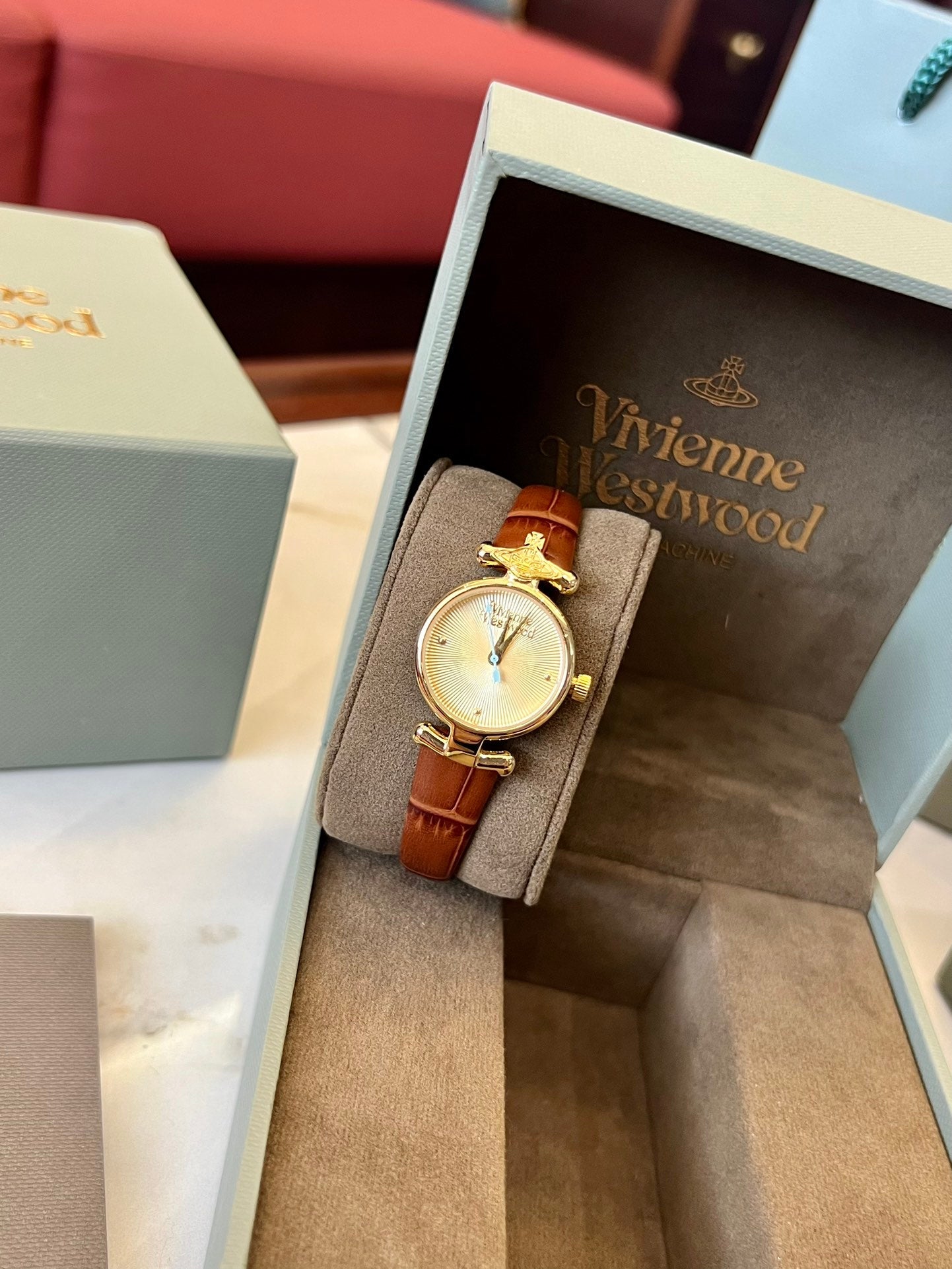 queen mother belt women's watch