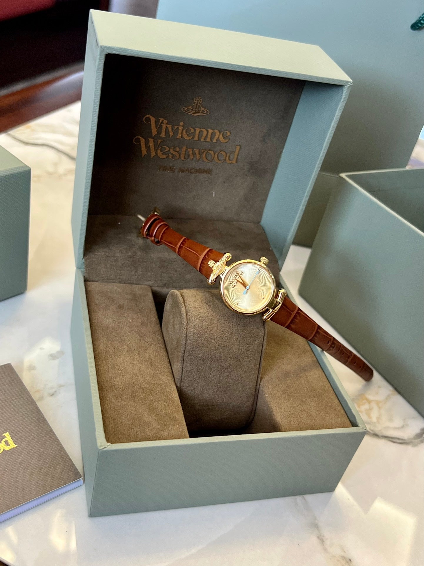 queen mother belt women's watch