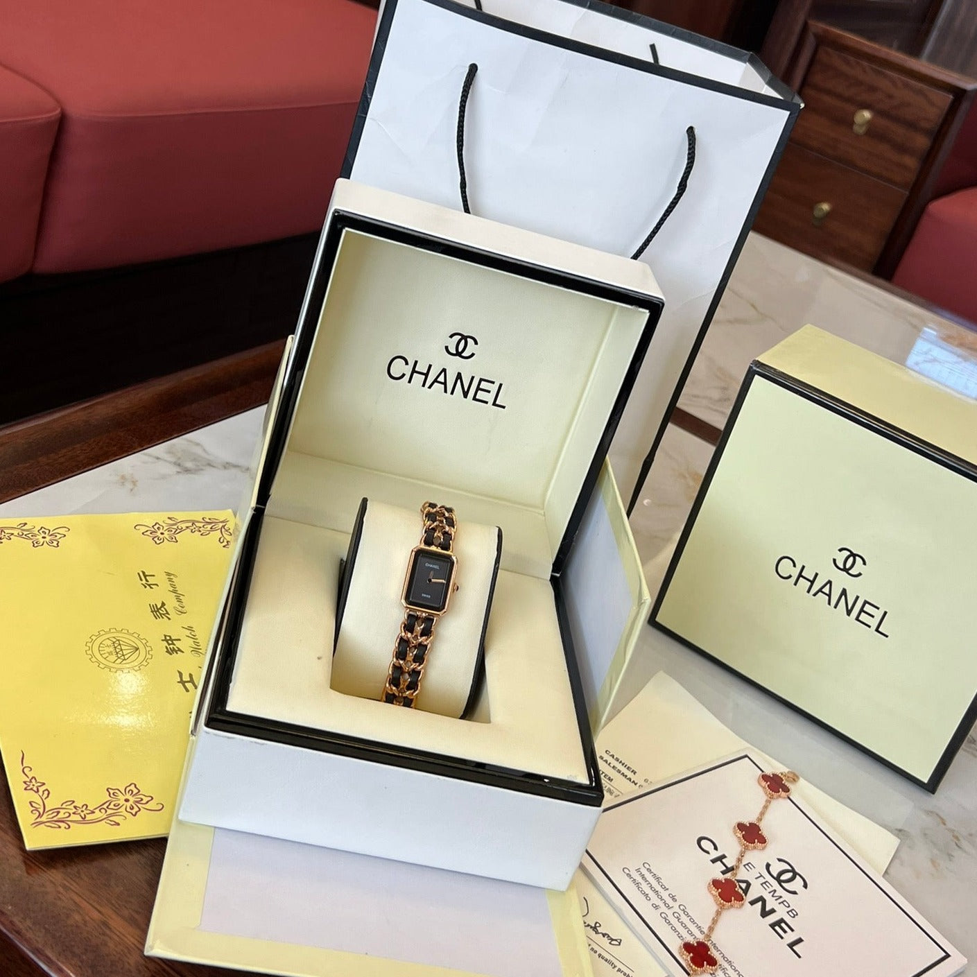 A four-leaf clover bracelet paired with a watch strap is absolutely perfect.